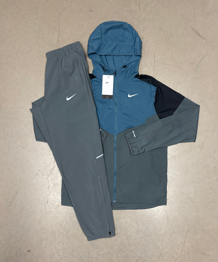 Nike Smoke Grey/Blue Windrunner Jacket x Nike Grey Miler Challenger Pants